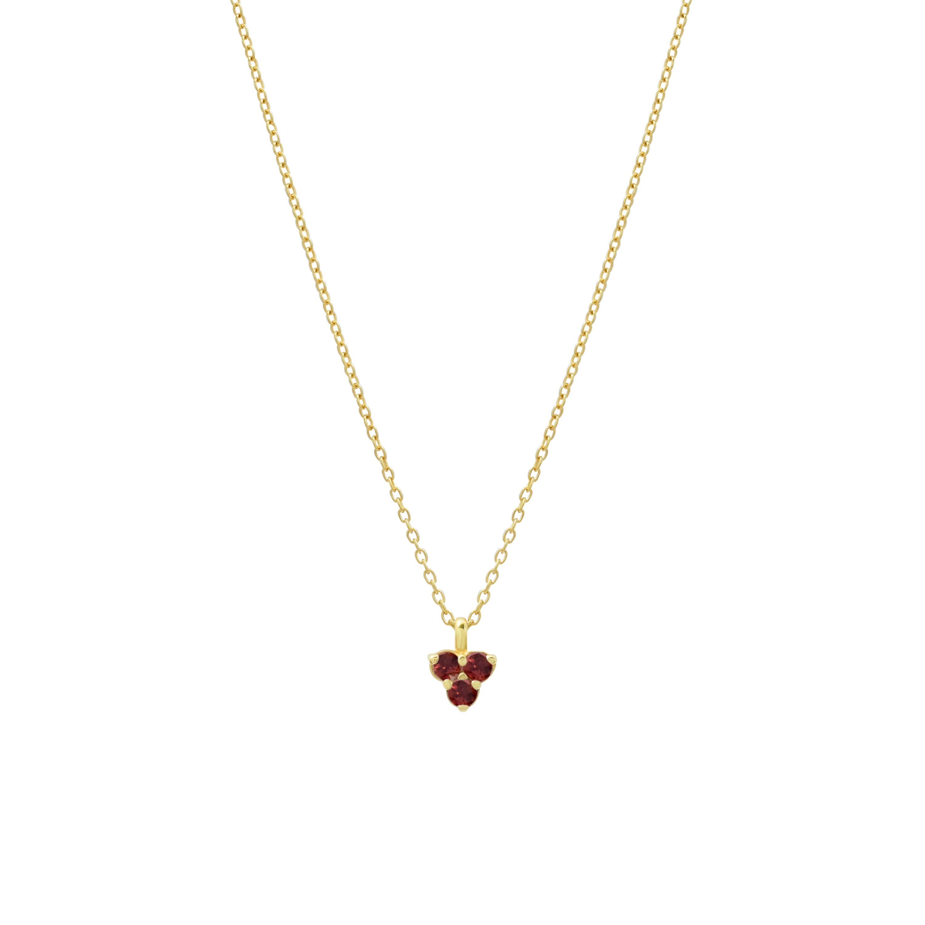 Gold necklace with a small triangle red garnet pendant on a white background