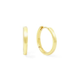 Gold hoop earrings on a white background