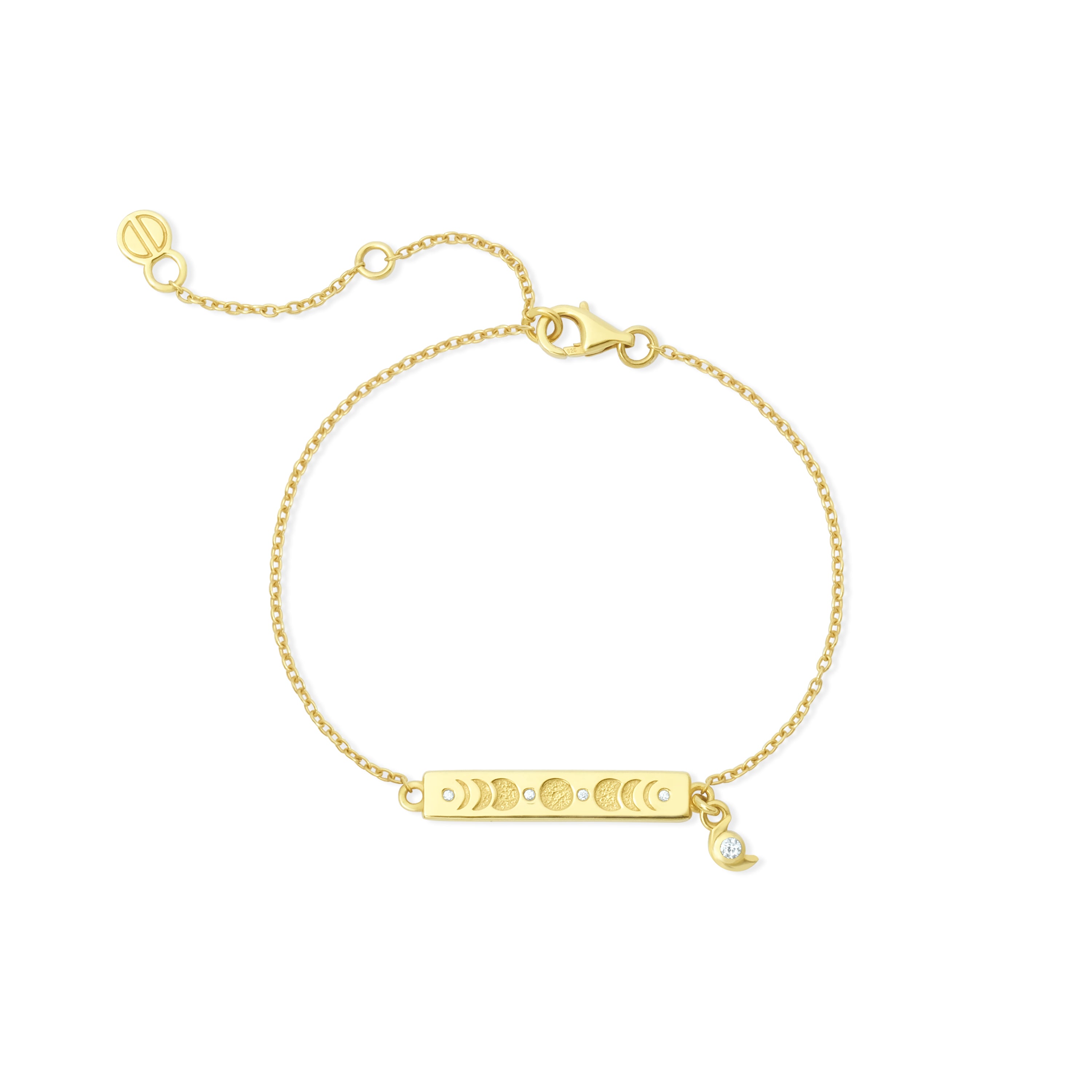 Gold bracelet with a bar charm featuring celestial moon phases on a white background