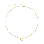 Gold necklace with a small round pendant on a white background