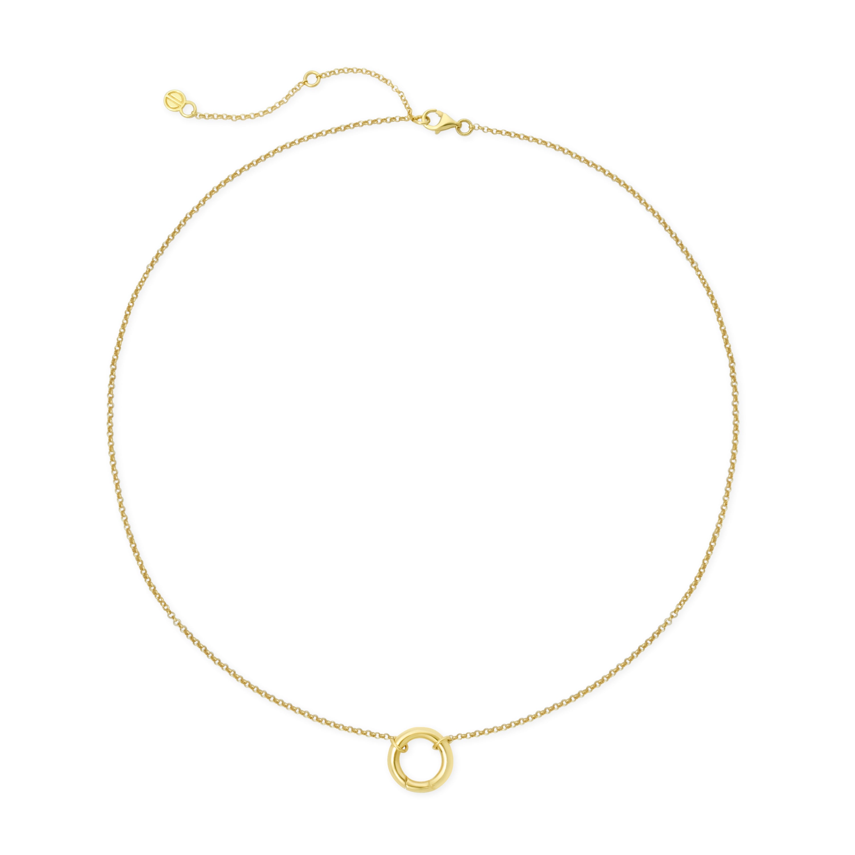 Gold necklace with a small round pendant on a white background