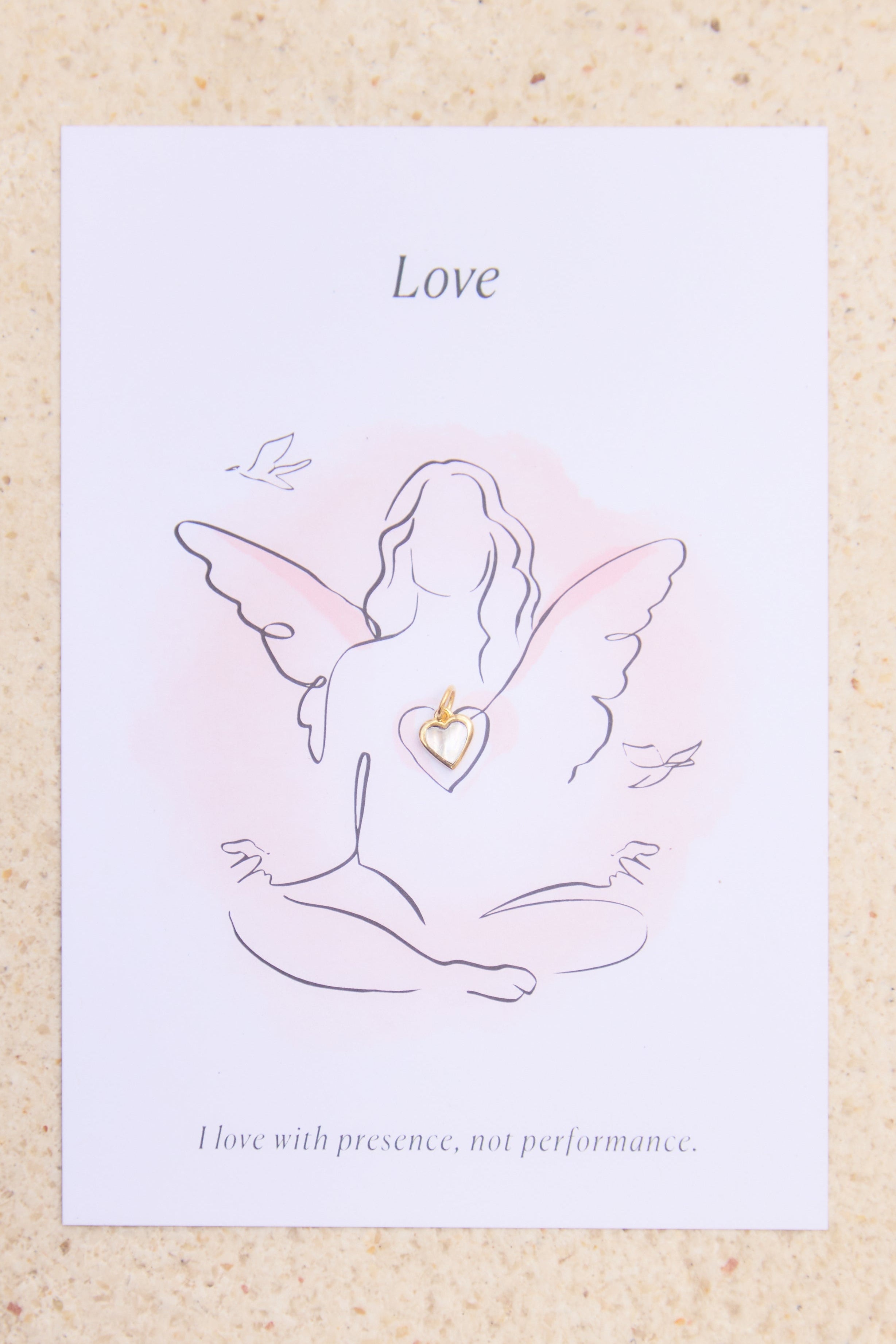 Feminine illustration with a heart and 'Love' text on a light background