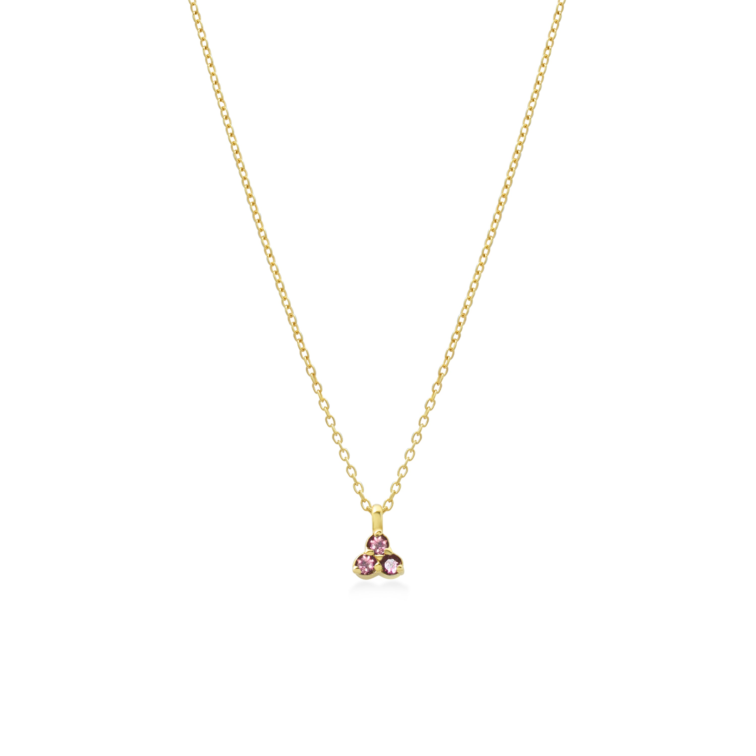Gold necklace with a small pink triangle gemstone pendant on a white background