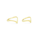 Gold open ring set on a white background